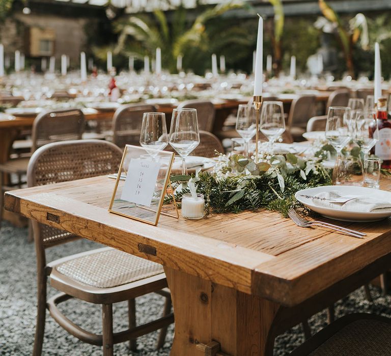 Anran Devon wedding venue with macrame chandelier lighting with minimalist wedding table decor 