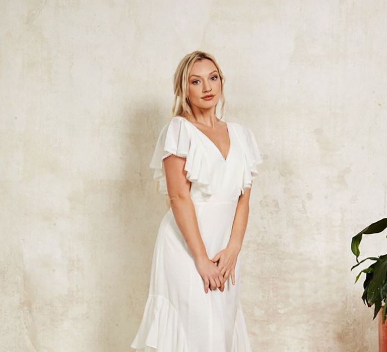 Sustainable wedding dress with waterfall ruffles from Indiebride London in boho style