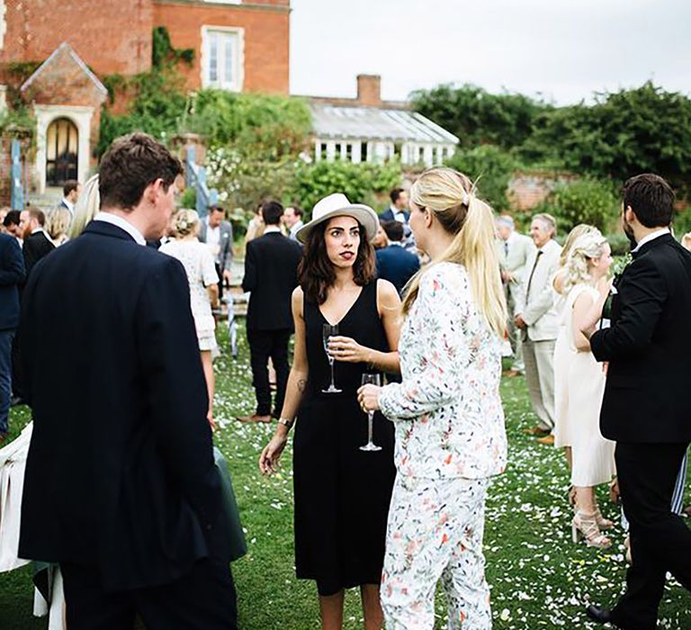 Wedding Guests at Outdoor Wedding at Childerley Hall in Cambridge by Tawny Photo