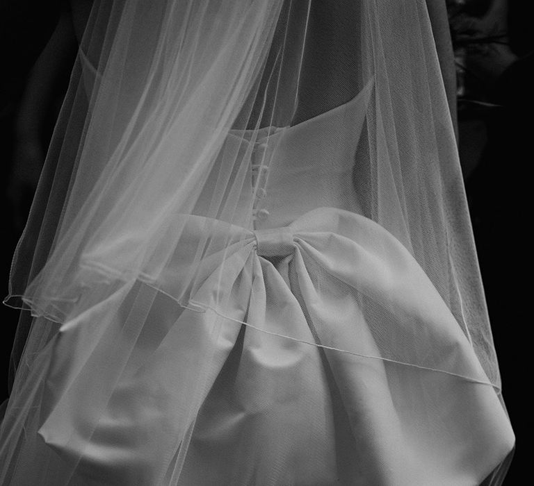 Bride wearing bow wedding dress 