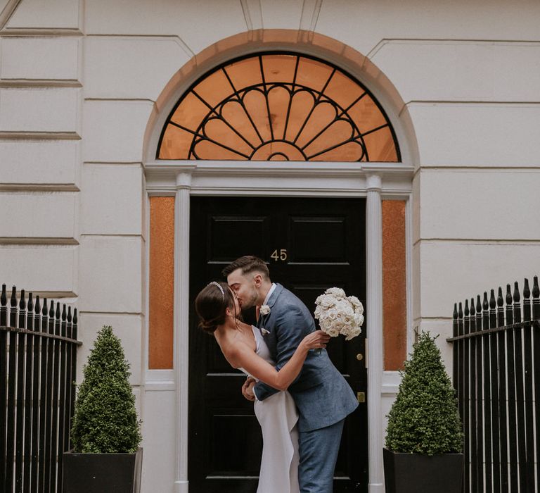 Bride and groom kissing at Old Marylebone Town Hall wedding 