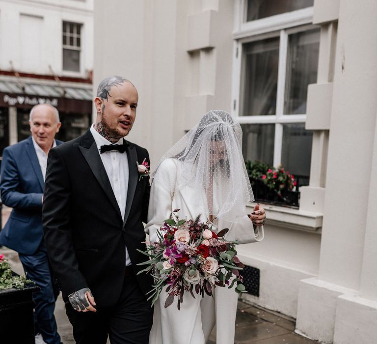 Bride in short polka dot veil