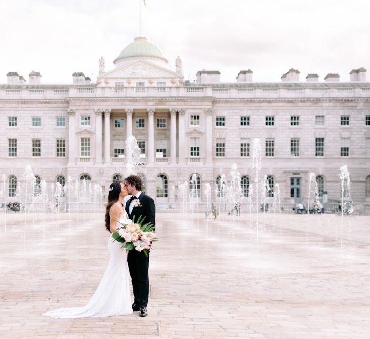 Bride and groom kissing at Somerset House wedding