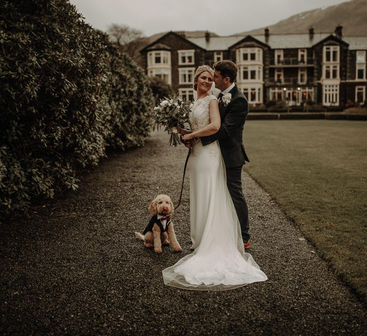 Lake District wedding at Inn on the lake, with Henry the poodle and happy newly-married couple