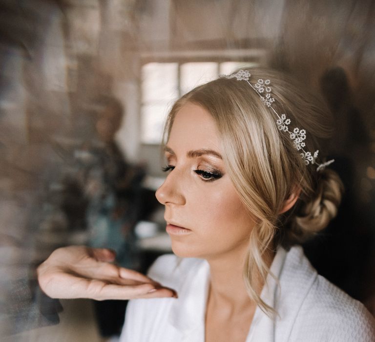 Bride getting ready on the morning of her spring wedding