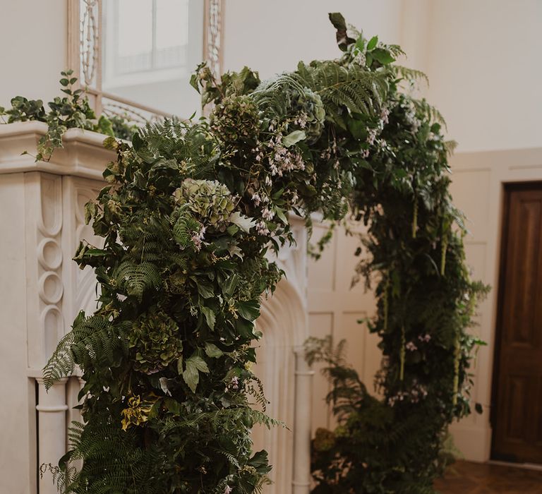 foliage and flower arch with hydrangeas and ferns