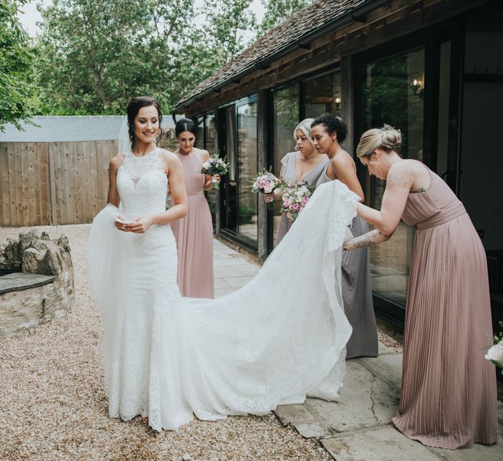 Bridesmaids sort out bride Christina Wu train