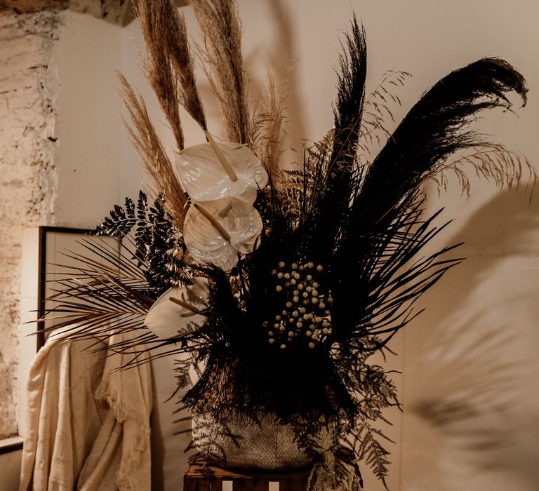 Black & white wedding decor floral decoration with pampas grass