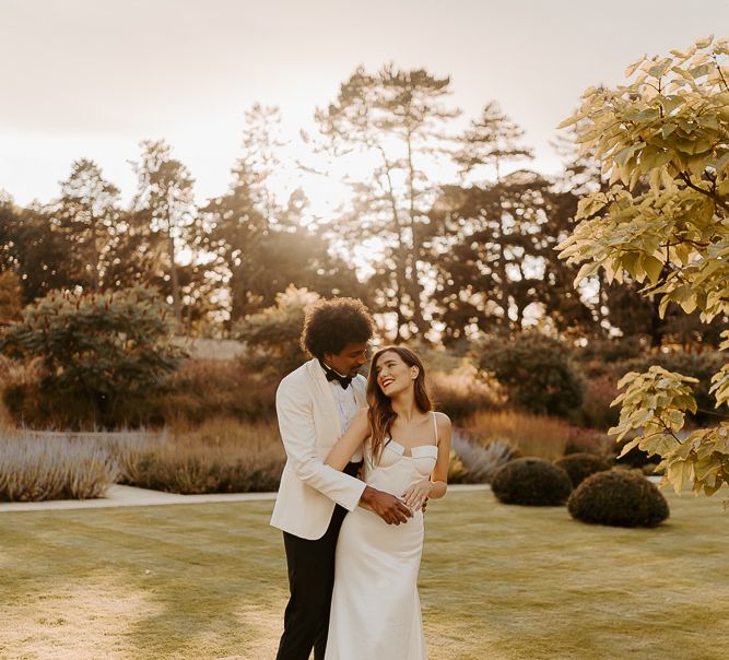 Bride and groom portrait at sunset 