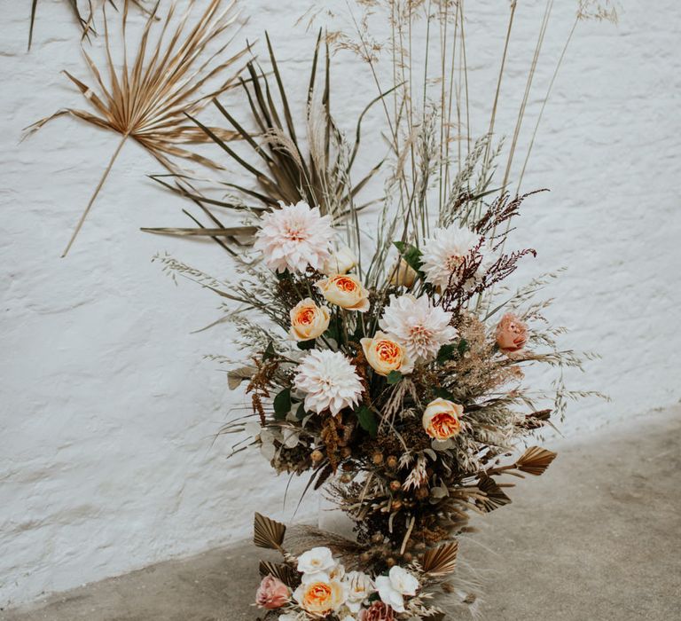 A mix of fresh and dried flowers were used for the modern centrepiece