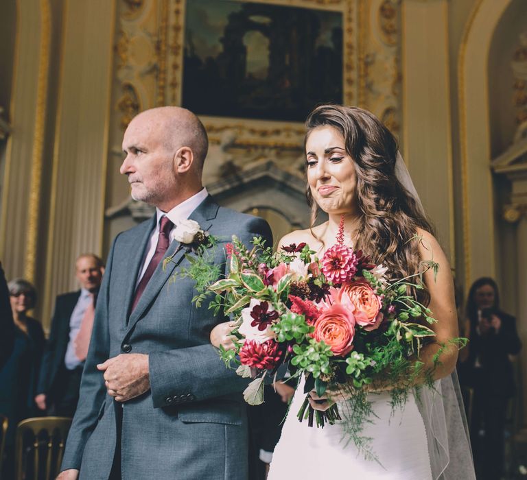 Father of the groom walking his daughter down the aisle at Orleans House Gallery wedding