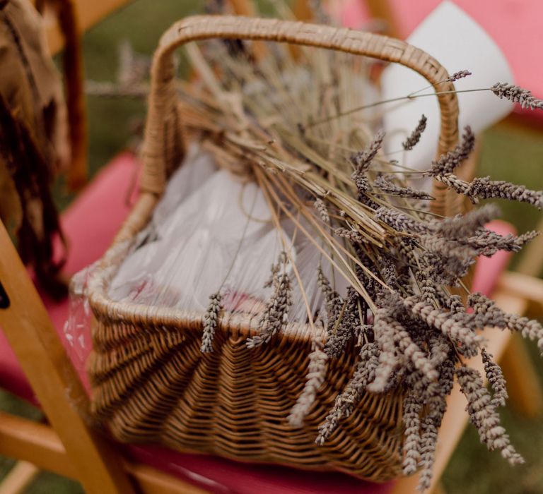 Woven wooden basket with dried lavender in at outdoor wedding at Hayne, Devon