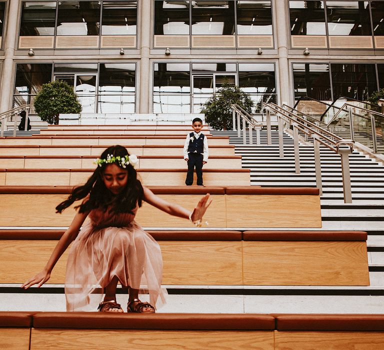 Flower girl and page boy playing on the steps at Brent Civic Centre wedding venue 