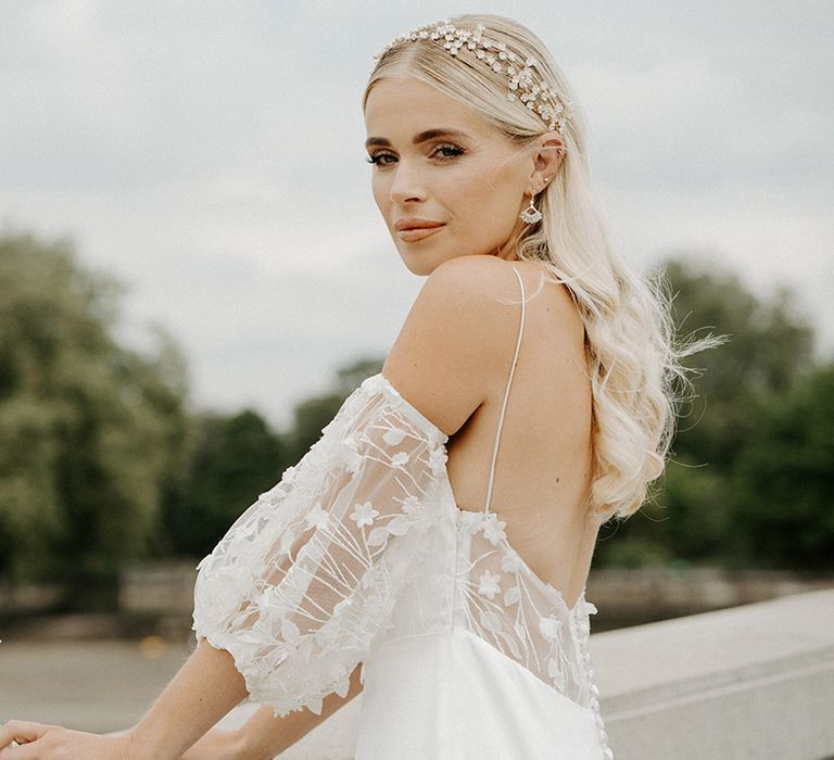 Beautiful bride in a slip wedding dress with lace detachable sleeves by Constellation Ame 