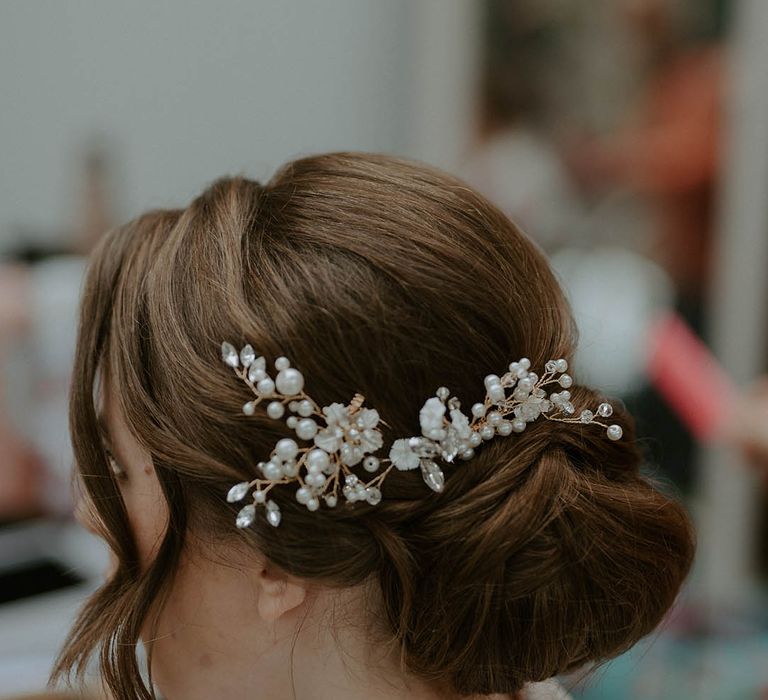 Embellished hairpiece with pinned updo 