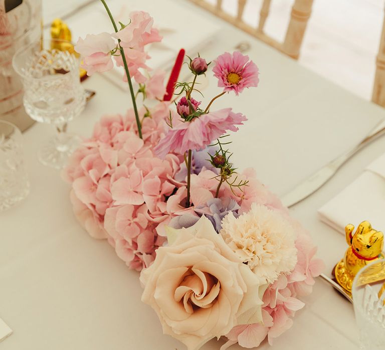 Pink, purple and white flower arrangements for tablescape 