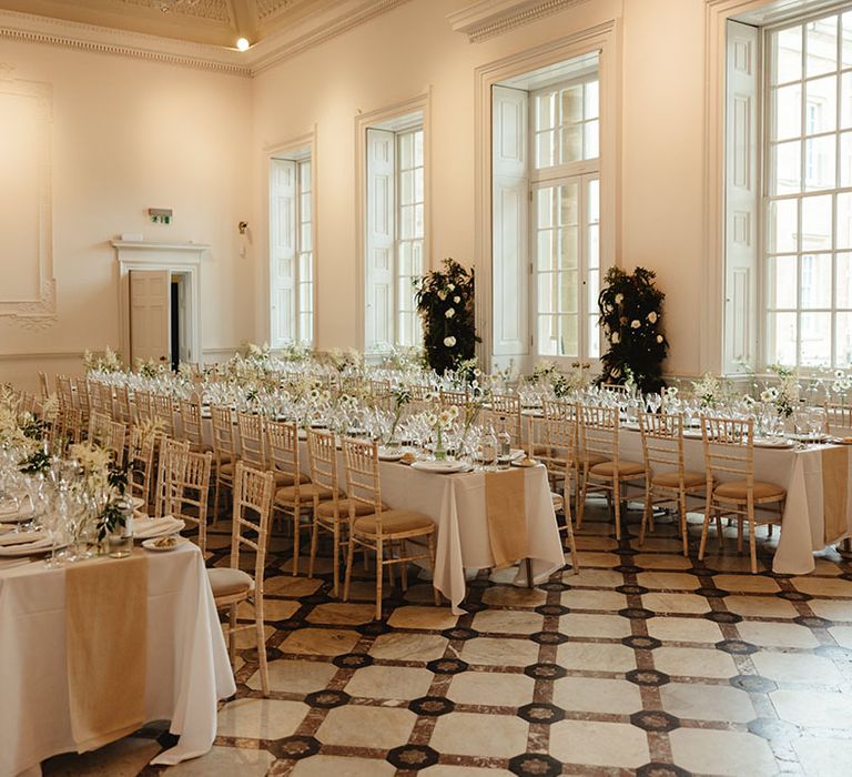 Wedding reception area at Compton Verney venue with clean and natural styling with lots of white 