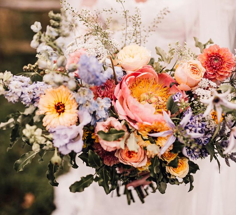 Yellow and purple pastel flower wedding bouquet 