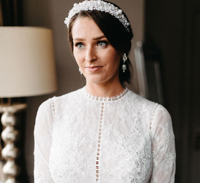 Lace wedding dress with high neck and long sleeves