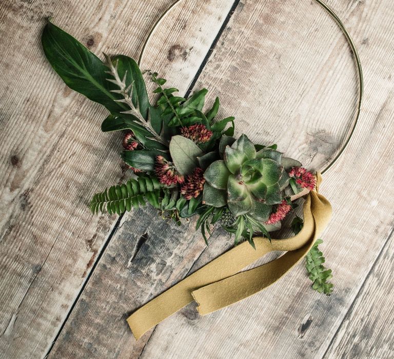 Floral crown with golden ribbon