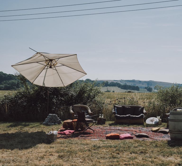 Boho chic furniture outdoors looking across fields