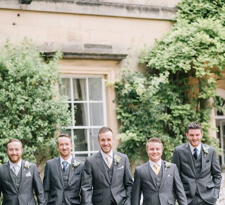 Groom and groomsmen in grey waistcoat with check waistcoat 