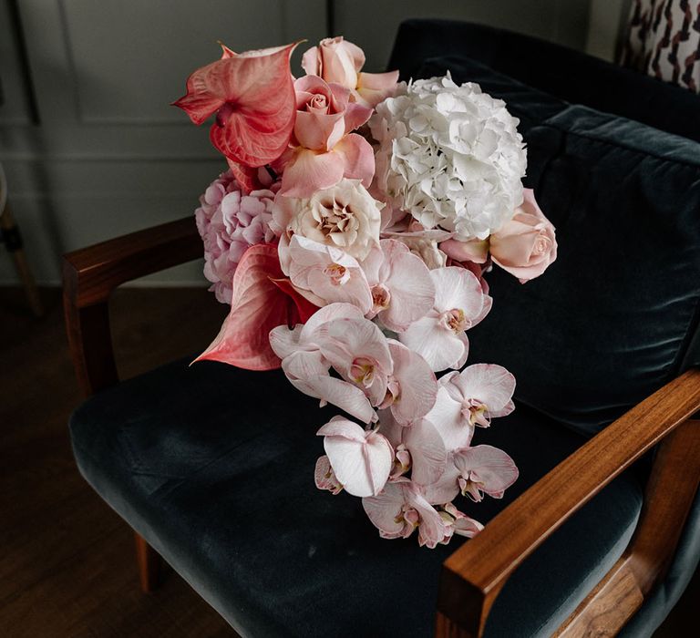 Bouquet of white and pink hydrangeas, a subtle mix pale pink cascading orchids & blush pink roses 