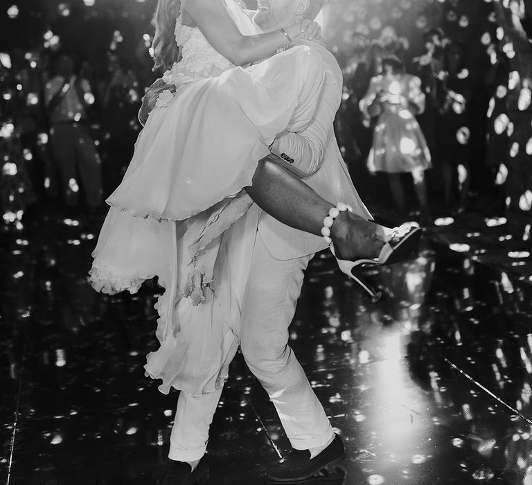 Bride and groom have their first dance together 