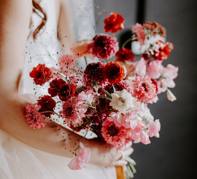 Bridal bouquet with magenta, pink and white wedding flowers 