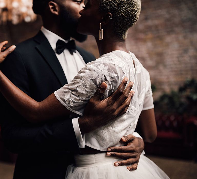 Black Bride and Groom share a first dance at Industrial London Wedding Venue, 100 Barrington 