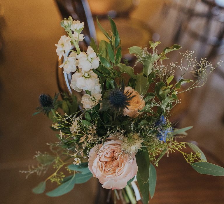 seasonal chair back wedding flower decor 