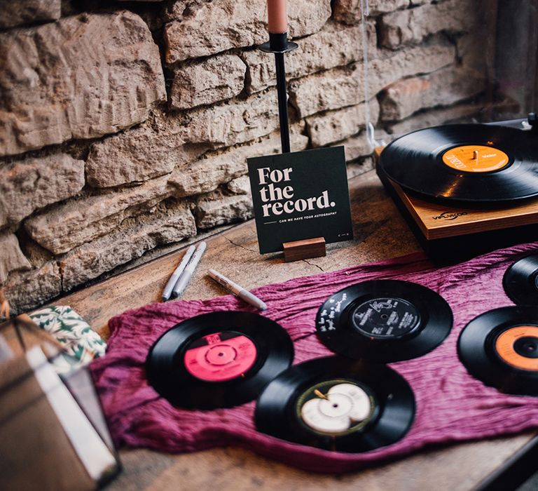 Alternative record wedding guest book idea for musical theme 70s wedding 