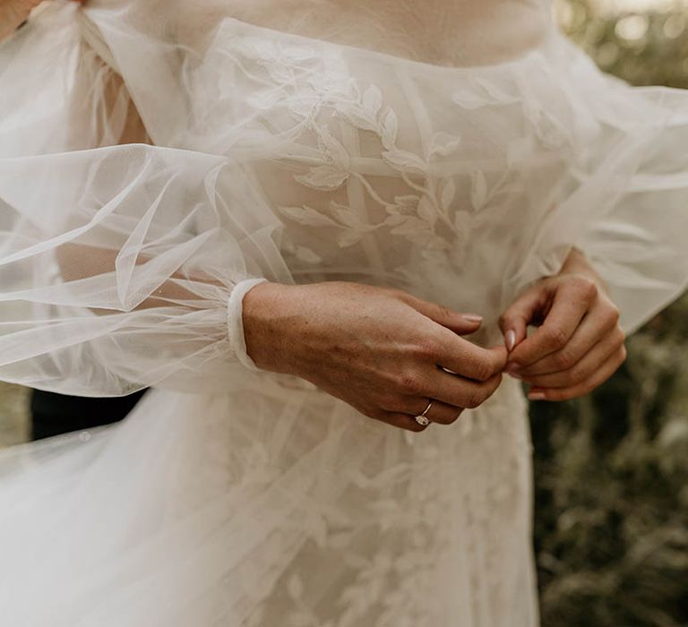 Bride in strapless Milla Nova wedding dress with tulle detachable sleeves for woodland Camp Katur wedding 