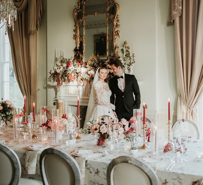 Bride and groom at wedding breakfast with luxury tablescape 