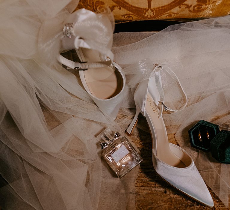 Miss Dior wedding perfume with white pointed wedding shoes from Quiz, green ring box and wedding veil 