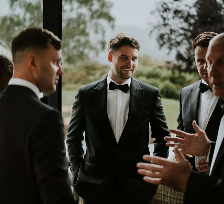 groom in black tuxedo Ben Barron