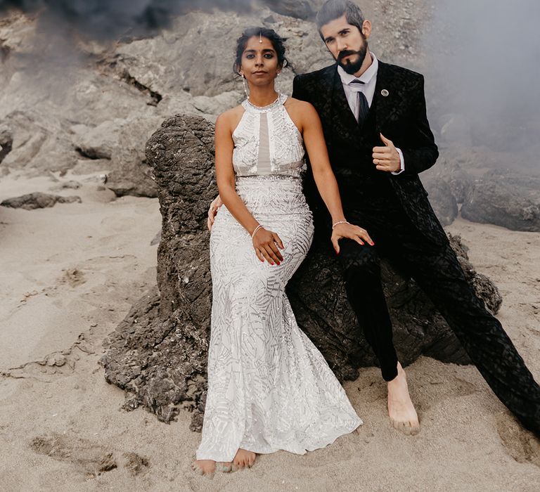 Moody coastal elopement with stylish bride and groom 