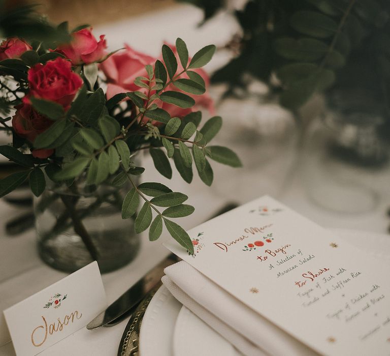 Place names and menu cards at place setting 