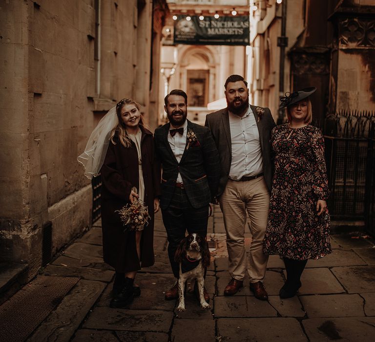 Bride and groom with their 2 witnesses at city elopement