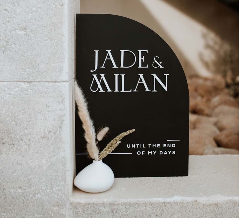 Black plexi signage reads 'Jade & Milan - Until the end of my days'