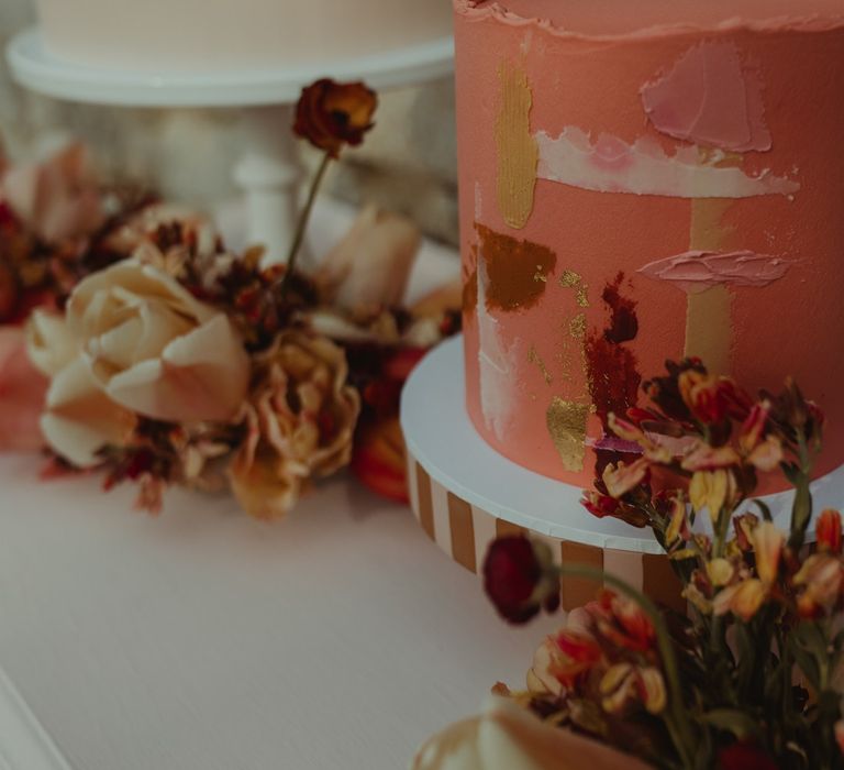 Contemporary wedding cake in blush and coral tones