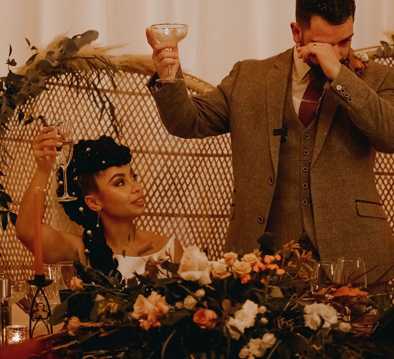 Groom in three piece suit becomes emotional during wedding speech at Pentney Abbey reception 