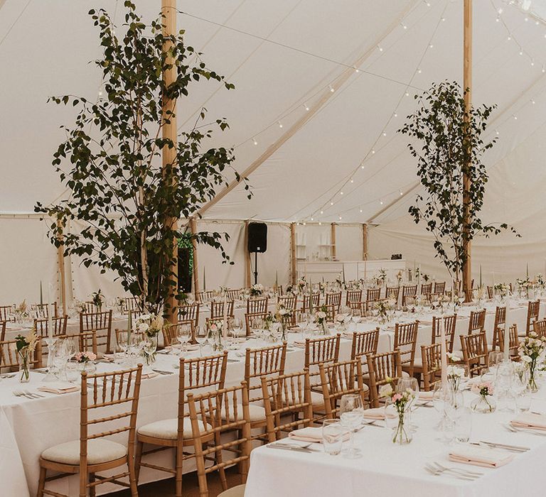 Marquee wedding breakfast at Came House in Dorset with light pink, white and green theme tablescape