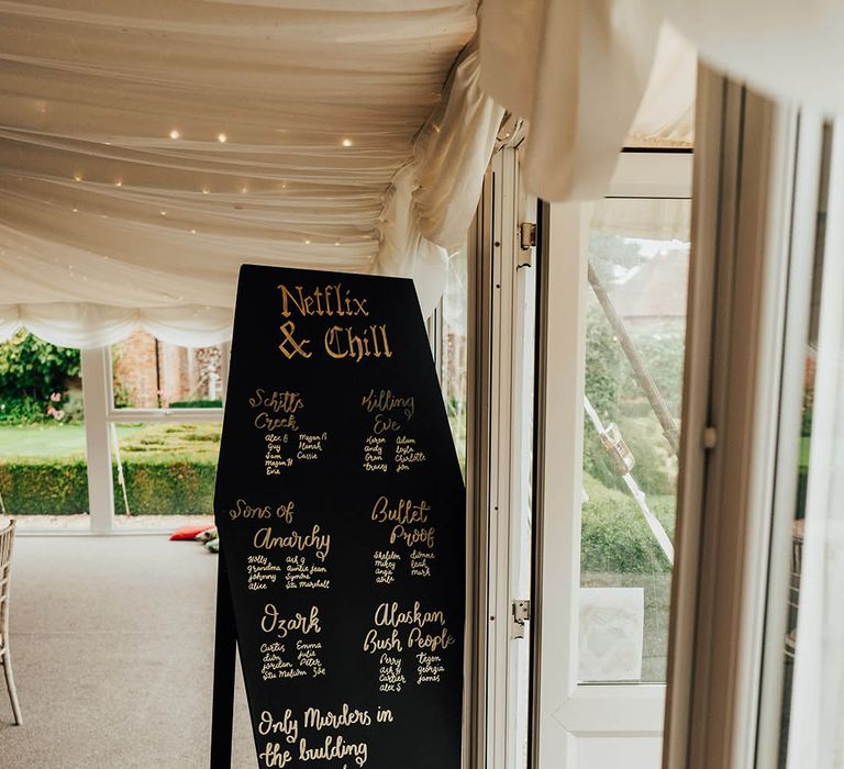 Black wedding coffin sign table plan and seating chart 