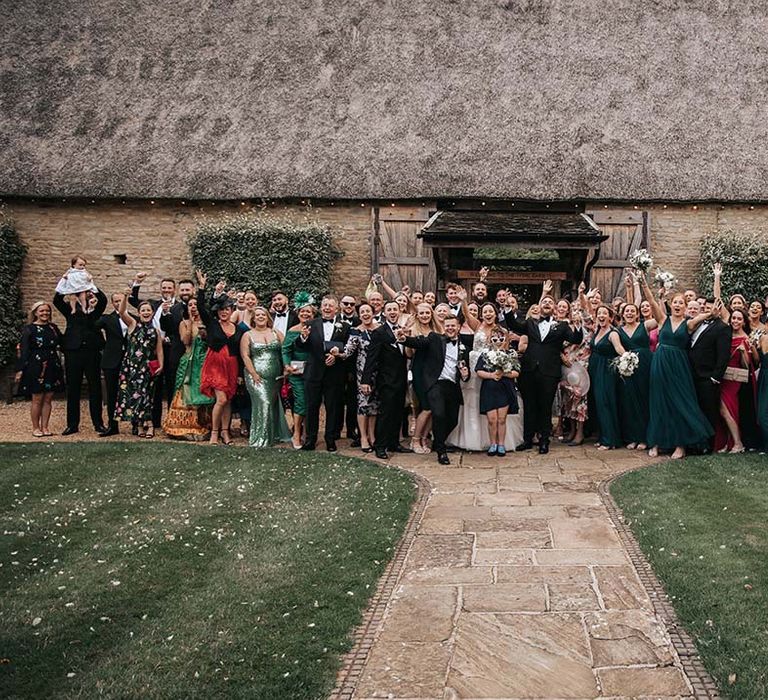 Group wedding guest photo outside The Tythe Barn Launton wedding venue