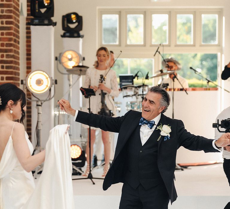 Father daughter dance at the wedding on custom dance floor 