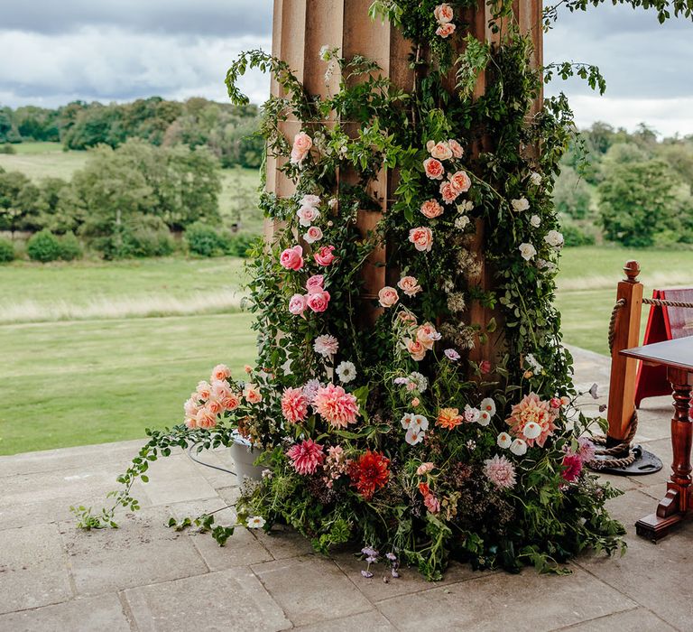 Pink wedding flower decorations decorating The Grange, Hampshire wedding venue 