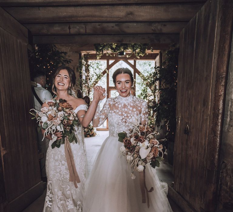 Confetti moment with bride in flower long sleeve high neck wedding dress with bride in floral dress 