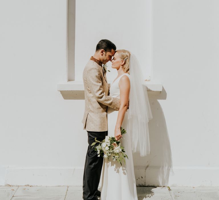 Intimate bride and groom portrait by Joasis Photography