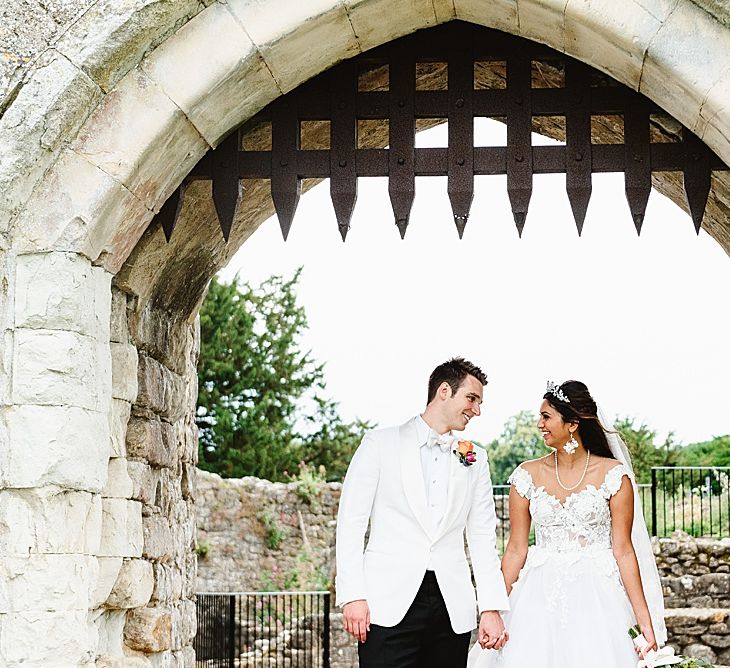 Bride and groom portraits by Fiona Kelly Photography on the grounds of Leeds Castle 